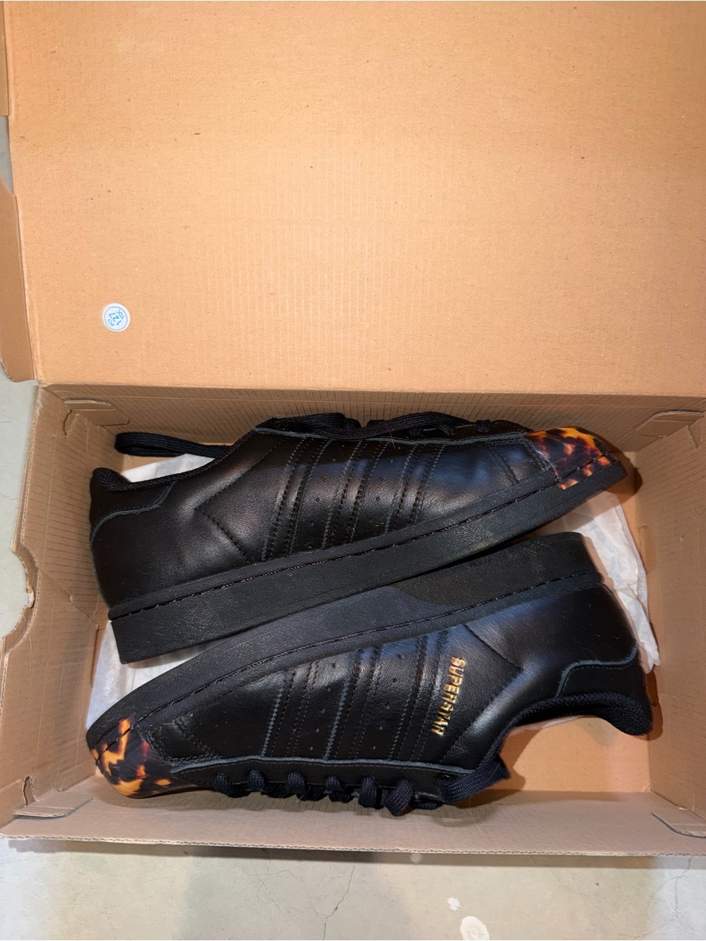 Black Womens Adidas Superstar Sneakers with Tortoiseshell Accent